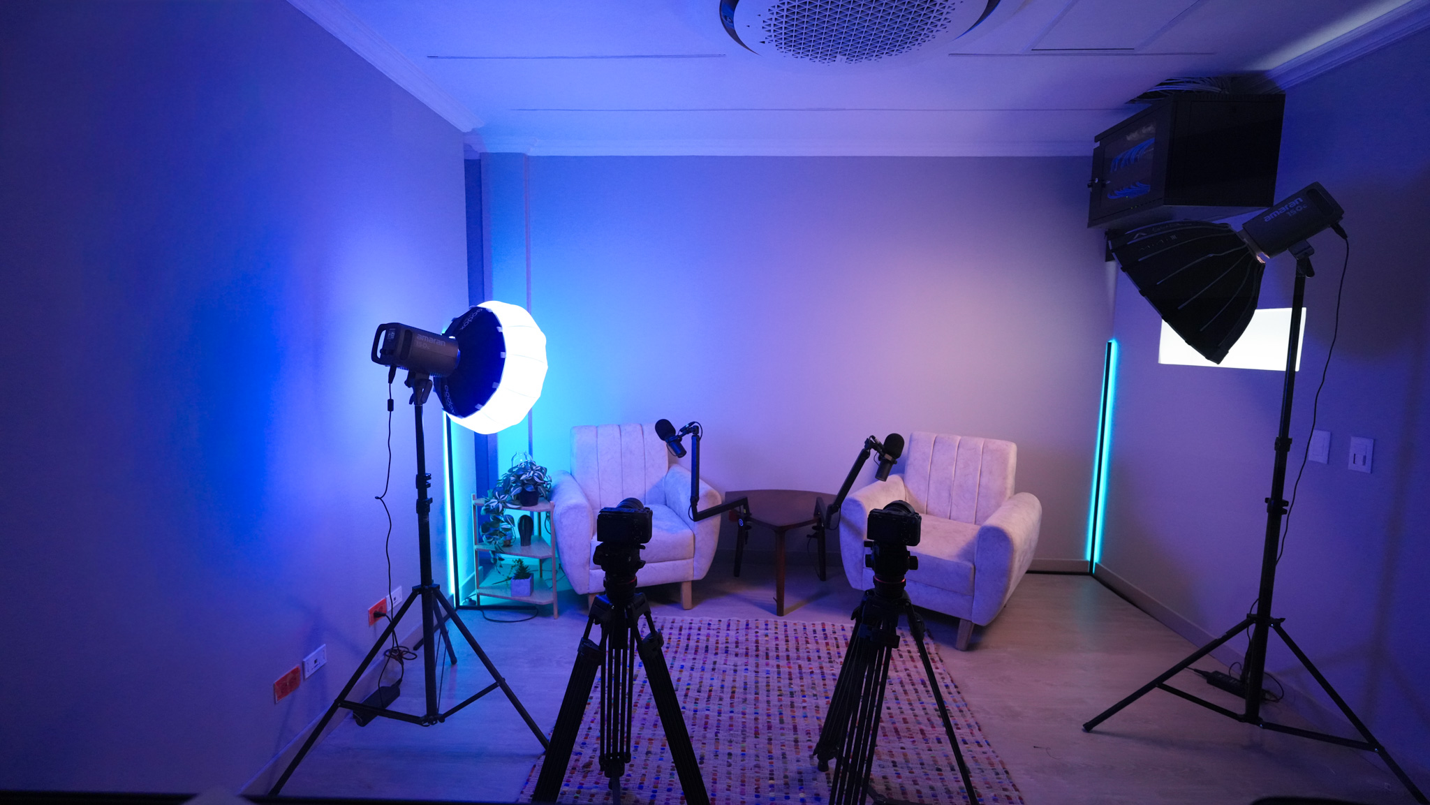 Wide overhead view of podcast room with all equipment