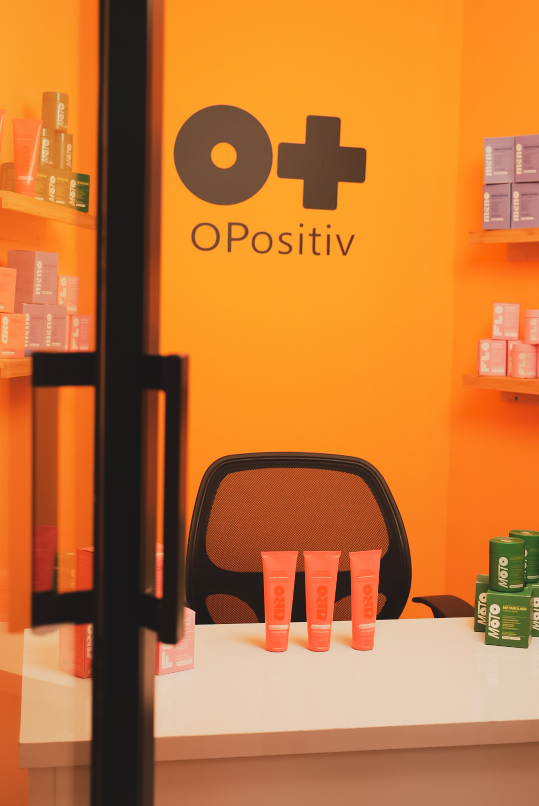 OPositiv set viewed through glass door